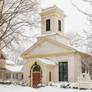 Outside of a curch on a snowy day