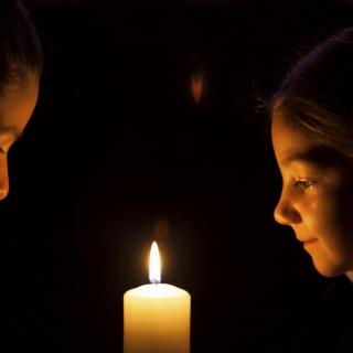 Little girls with candle